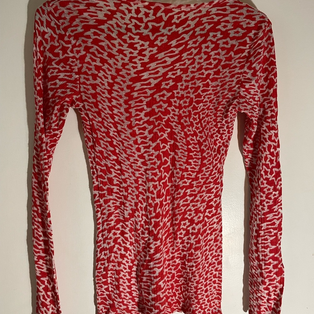 Cute unbranded stretch and sheer sweater